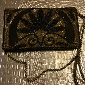 Beautiful black and gold vintage purse.